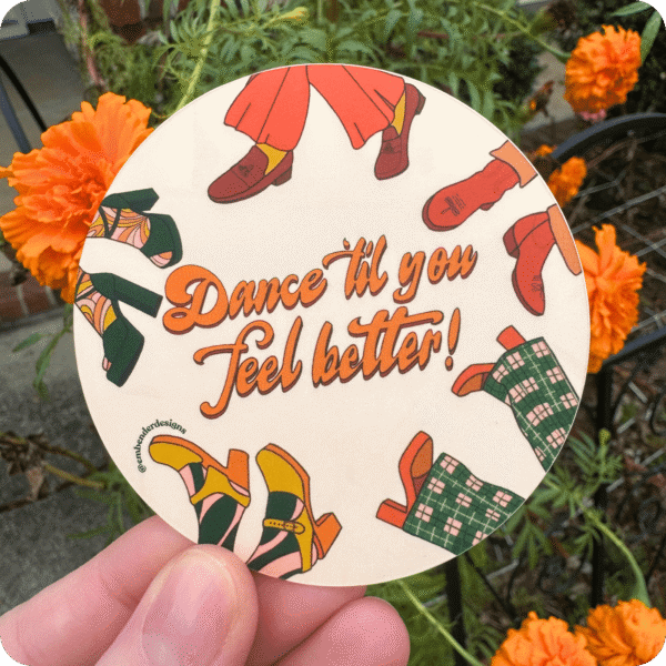 Dance 'til you feel better! Circle Sticker, photo taken outside in front of orange flowers.
