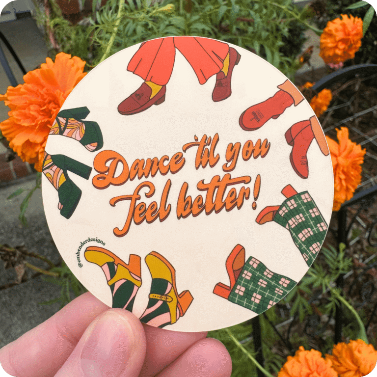 Dance 'til you feel better! Circle Sticker, photo taken outside in front of orange flowers.